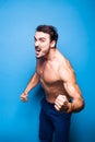 Shirtless man with beard on blue background Royalty Free Stock Photo
