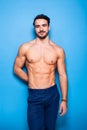 Shirtless man with beard on blue background Royalty Free Stock Photo