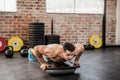 Shirtless man doing bosu push ups Royalty Free Stock Photo