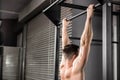 Shirtless man doing pull up Royalty Free Stock Photo