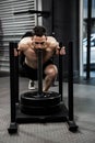 Shirtless man pushing heavy weights Royalty Free Stock Photo