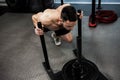 Shirtless man pushing heavy weights Royalty Free Stock Photo