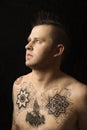 Shirtless man with tattoos. Royalty Free Stock Photo