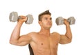 Shirtless strong man close shoulder press