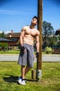 Shirtless young man resting after workout outdoor Royalty Free Stock Photo