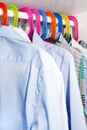 Shirts Hanging On Colourful Hangers Royalty Free Stock Photo