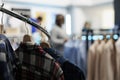 Shirts hanging on rack in clothing store Royalty Free Stock Photo