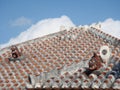 Shisa lion dog guardian on a traditional tile roof in Okinawa, Japan Royalty Free Stock Photo