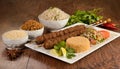 Shish kebab with mixed rice, kibbe and variety of ethnic lebanese food.