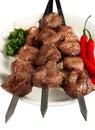 Shish kebab with parsley, paprika and cake on whit Royalty Free Stock Photo