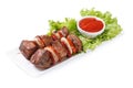 Shish kebab from pork with vegetables and sauce isolated