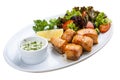 Shish kebab from salmon with vegetables and salad. On a white plate Royalty Free Stock Photo