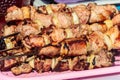 Shish kebab on skewers close-up. Pork shashlik cooked on grill