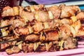 Shish kebab on skewers close-up. Pork shashlik cooked on grill