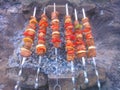 Shish kebab on skewers on a grill