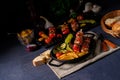 Shish kebab with various vegetables and spice country potatoes