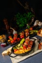 Shish kebab with various vegetables and spice country potatoes