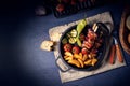 Shish kebab with various vegetables and spice country potatoes