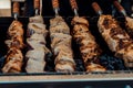 Shish kebabs are baked on the grill Royalty Free Stock Photo