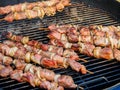 Shish kebabs on skeweres are cooked on charcoal grill Royalty Free Stock Photo