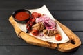 Shish pork kebab with cherry tomato and sweet pepper, Grilled marinated meat skewers on wooden board.