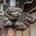 Shishi Lion and Baku or zoubana Tapir Nosing wooden carved guardian of Marishisonten-do Temple. Shishi Lion and Baku or zoubana Ta