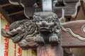 Shishi Lion and Baku or zoubana Tapir Nosing wooden carved guardian of Marishisonten-do Temple. Shishi Lion and Baku or zoubana Ta