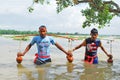 Shiva devotee bathing during holy festival of shravan month