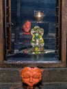 Shiva Lingam and Nagarala at The circular Nandi mandapa at the Pataleshwar cave