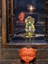 Shiva Lingam and Nagarala at The circular Nandi mandapa at the Pataleshwar cave