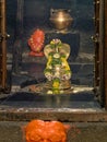 Shiva Lingam and Nagraja Kirtimukha at the doorstep at Pataleshwar stone