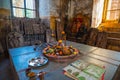 Shiva Lingam temple interior ornate with flowers and colors with majestic light coming from window, India. Architectural details o