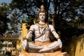 Shiva Statue in Rishikesh, India. God Shiva sits in a Lotus position and meditates
