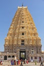 Shiva Virupaksha Temple. Hampi, Karnataka, India. White yellow restored temple against the blue sky. Carving stone