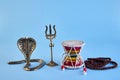 Shivaratri background with Shivas trident, Pellet Drum Damroo musical instrument ans snake . Maha Shivratri festval