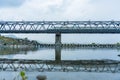 Shizuoka, Japan, April 3, 2023 : Shinkansen train passing over a bridge over a river