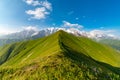 Shkhara and Ushguli peaks with whole Main Caucasus ridge on a sunny day, Adishi, Svaneti, Georgia Royalty Free Stock Photo