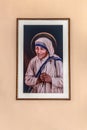 Portrait of Mother Teresa on the wall inside the St Stephen Catholic Church