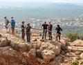 Two athletes talk to tourists before going down - climbing - snapping - the rope from the mountain to Keshet, Cave in northern