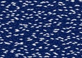 Shoal of fish on a blue water
