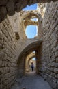 Tourists walk through a section of the ruins of Shobak Castle in Jordan.