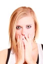 Picture of amazed woman with hand over mouth Royalty Free Stock Photo