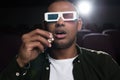 shocked african american man in 3d glasses watching movie Royalty Free Stock Photo