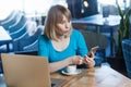 Shocked amazed woman working on laptop, having break, checking social networks reading breaking news Royalty Free Stock Photo