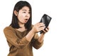 Shocked Asian woman hand open empty wallet no money for debt