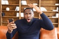 Shocked black man by the bad news Royalty Free Stock Photo