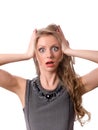 Shocked blonde female looking at you isolated Royalty Free Stock Photo