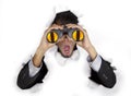 Shocked businessman with binoculars Royalty Free Stock Photo