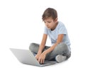 Shocked child with laptop on white background