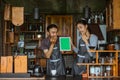 shocked couple of barista closing their mouth with their hands Royalty Free Stock Photo